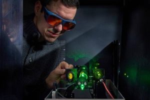 The Single Mode Laser or the Single Frequency Laser is a low cost single longitudinal mode efficient laser for use in spectroscopy, optical metrology communications amongst others. The picture shows the setup along with the expert behind the technology.